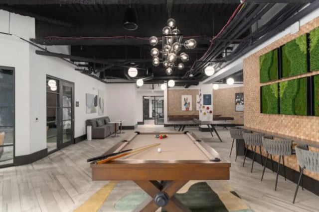 Billiard table with balls and cues common area at ANOVA uCity Square in Philadelphia Student Accommodation