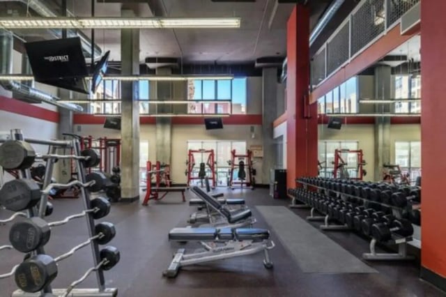 Dumbbells barbells and weight machines gym equipment at The District on Apache in Tempe Student Accommodation