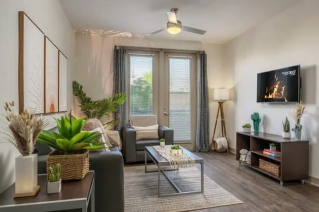 Sofa coffee table TV and plants Living room at The District on Apache in Tempe Student Accommodation
