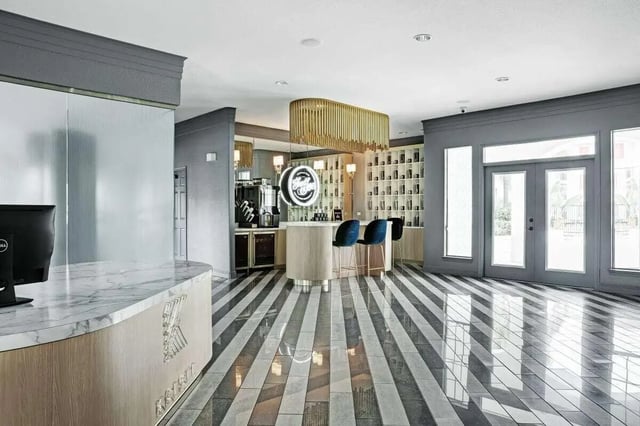 Check-in desk coffee bar and lounge area at The Kristi in Corpus Christi Student Accommodation