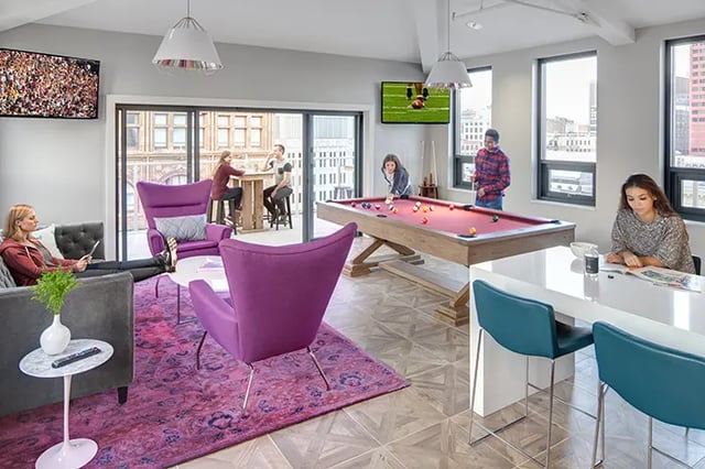 Pool table seating area TV and lounge living area at Arc at Old Colony in Chicago Student Accommodation