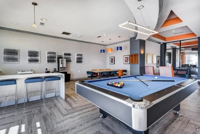 Pool table bar area and dining table game room at High View in San Antonio Student Accommodation
