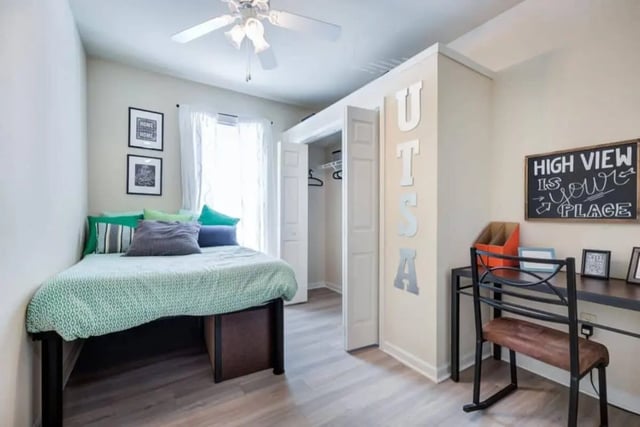 Bed desk closet with UTSA letters bedroom at High View in San Antonio Student Accommodation