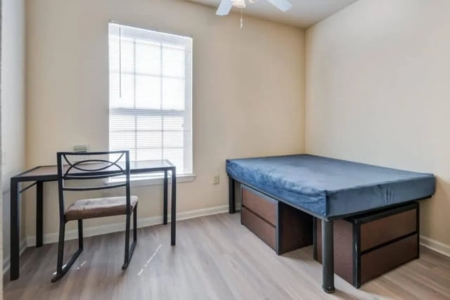 Bed desk chair and drawers bedroom at High View in San Antonio Student Accommodation
