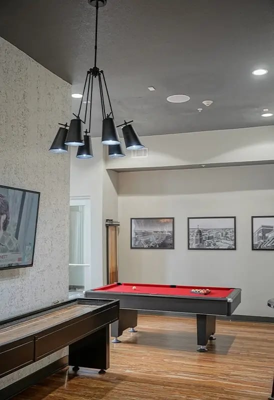 Pool table shuffleboard and TV entertainment area at Academy in Lincoln Student Accommodation
