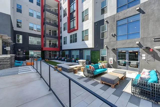 Courtyard with seating fire pit and beanbags exterior at Academy65 in Sacramento Student Accommodation