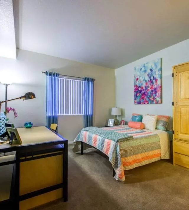 Bed desk lamp painting bedroom at GrandMarc at University Village in Riverside Student Accommodation