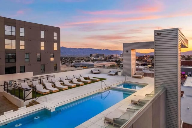 Pool lounge chairs and hot tubs exterior at Malibu Tucson Apartments in Tucson Student Accommodation