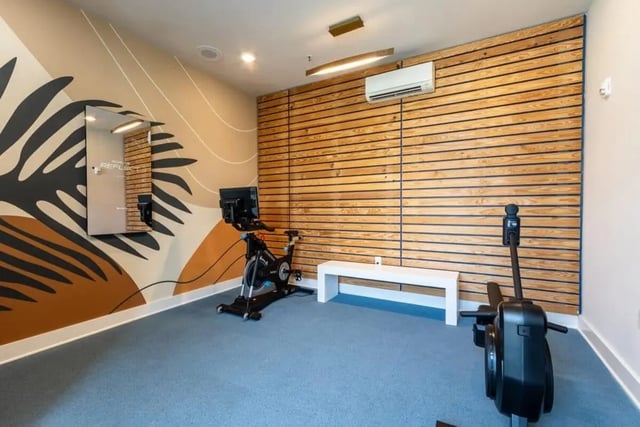 Spin bike rowing machine white bench gym at The Eastern On 10th in Greenville Student Accommodation