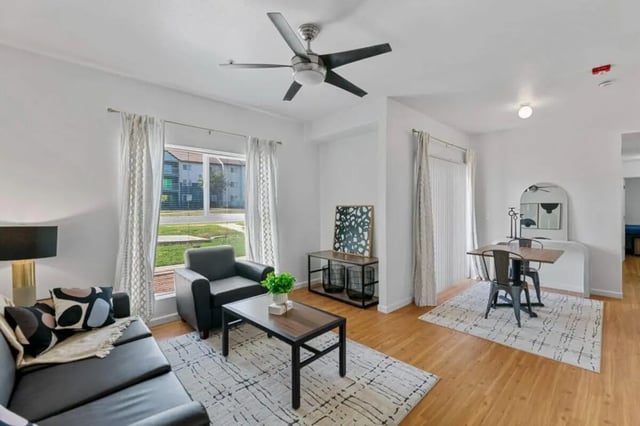 Sofa armchair coffee table dining set living room at Green Spring in San Marcos Student Accommodation