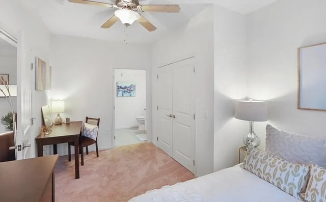 Desk chair lamp and closet bedroom study area at Greene Crossing in Columbia Student Accommodation