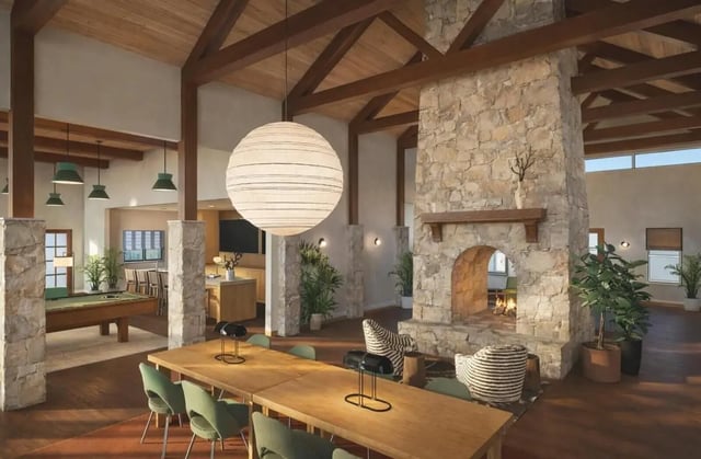 Dining table fireplace pool table living area at The Ranch Student Apartments in San Marcos Student Accommodation