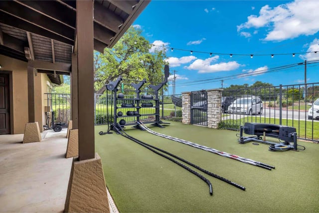 Gym equipment and battle ropes outdoor area at The Ranch Student Apartments in San Marcos Student Accommodation