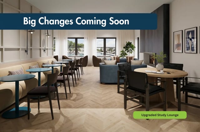 Modern lounge area with sofas chairs and tables lounge area at The View Apartments in State College Student Accommodation
