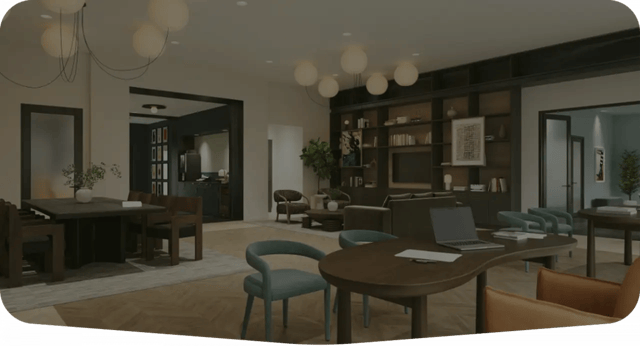 Dining table chairs laptop bookshelves lounge living area at The View Apartments in State College Student Accommodation