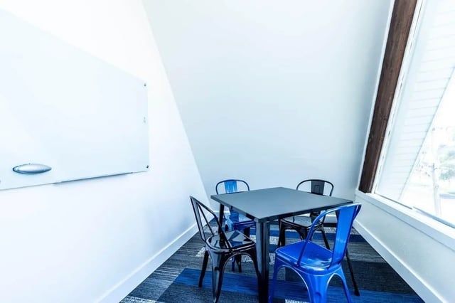 Whiteboard table and chairs study area at Alpine Chalet in Rexburg Student Accommodation