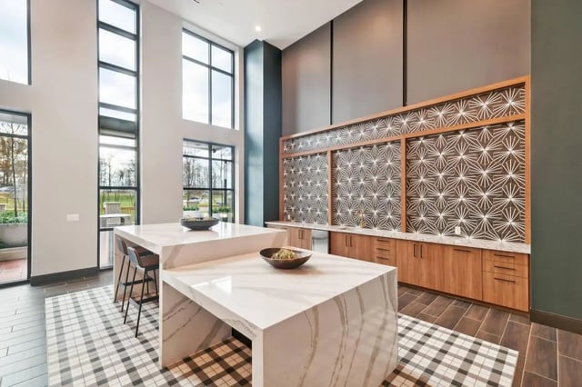 Modern kitchen with island and decorative wall kitchen at The Main on University in Fairfax Student Accommodation