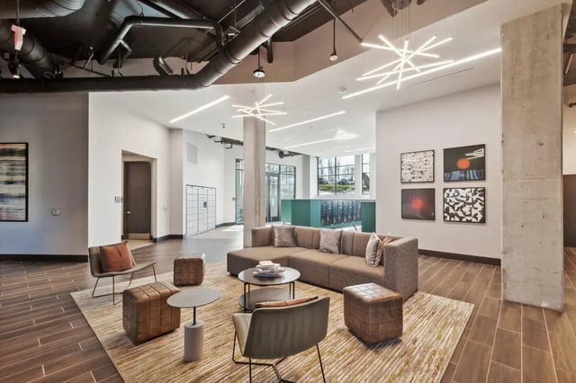 Lobby with sofa art and mailboxes Common area at The Main on University in Fairfax Student Accommodation