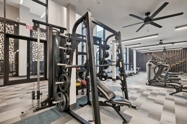 Weight rack treadmills elliptical machines gym at The Main on University in Fairfax Student Accommodation