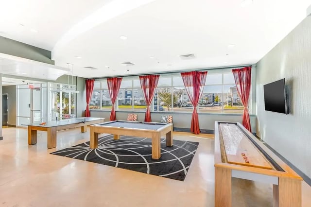 Pool and shuffleboard tables playing area at The Avenue at Orono in Orono Student Accommodation