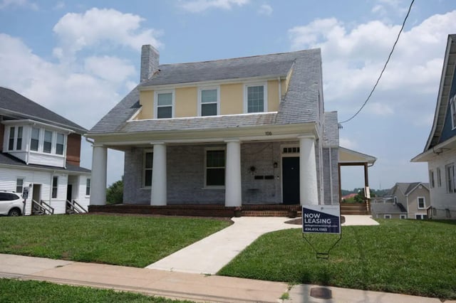 Porch with columns and windows exterior at College Corners on High in Farmville Student Accommodation