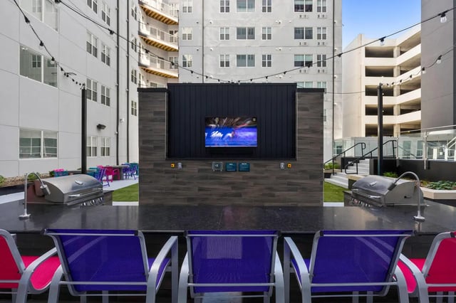 Grills television and seating outdoor area at Atmosphere Lincoln in Lincoln Student Accommodation