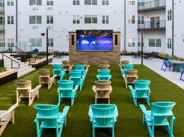 Outdoor cinema seating with large screen and chairs Entertainment area at Atmosphere Lincoln in Lincoln Student Accommodation