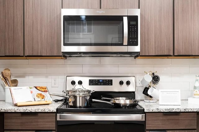 Microwave oven pots and pans on stove kitchen at The Indy in Marietta Student Accommodation