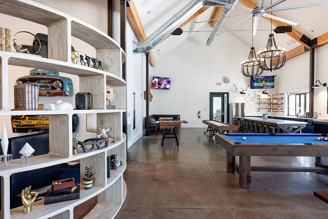Pool table foosball tables lounge area living room at University Trails Apartments in Ann Arbor Student Accommodation
