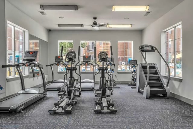 Treadmills ellipticals stair climber gym equipment gym at The Rendezvous Apartments in Edmond Student Accommodation