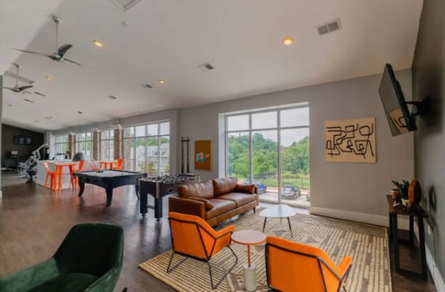 Pool table foosball table sofas chairs living room at Knox Ridge in Knoxville Student Accommodation