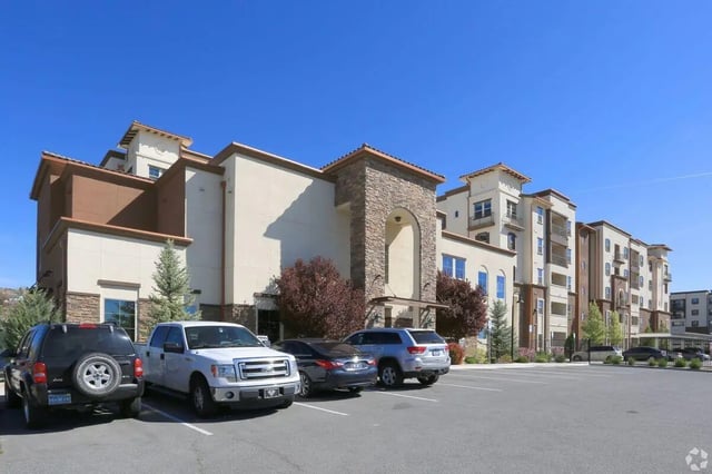 Apartment building cars parked on lot exterior at The Republic in Reno Student Accommodation