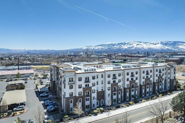Apartment building with many balconies and parking exterior at The Republic in Reno Student Accommodation