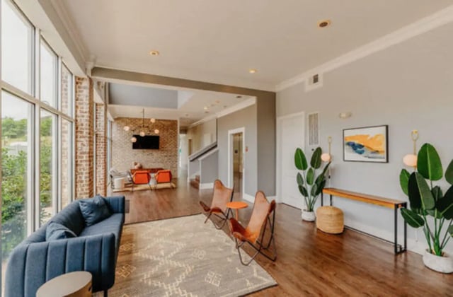 Blue couch patterned rug butterfly chairs living room at Knox Ridge in Knoxville Student Accommodation