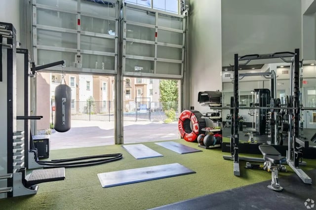 Punching bag mats weights and gym equipment fitness area at The Republic in Reno Student Accommodation