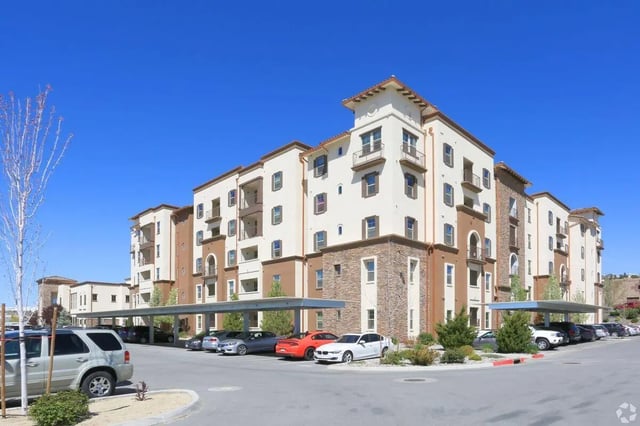 Apartment building with cars parked exterior at The Republic in Reno Student Accommodation