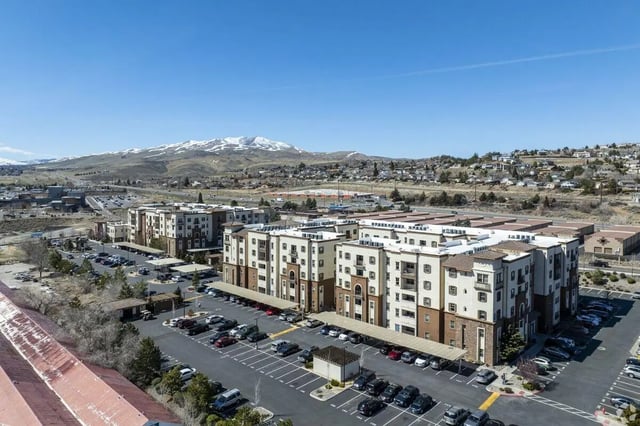 Apartment buildings with parking lots exterior at The Republic in Reno Student Accommodation