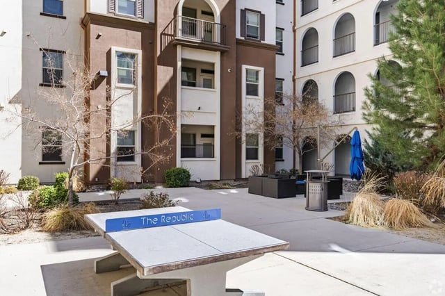 Ping pong table outdoor seating and building exterior at The Republic in Reno Student Accommodation