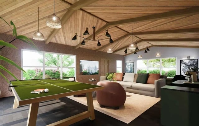 Ping pong table couch and artwork living room at Market 100 in Statesboro Student Accommodation