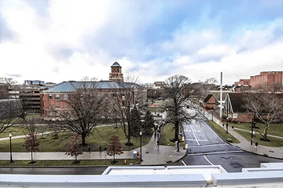 Campus buildings and a street exterior at The View on High in Columbus Student Accommodation