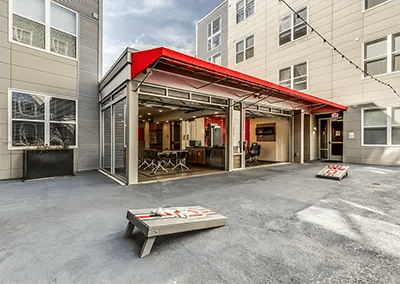 Cornhole games outdoor lounge area exterior at The View on High in Columbus Student Accommodation