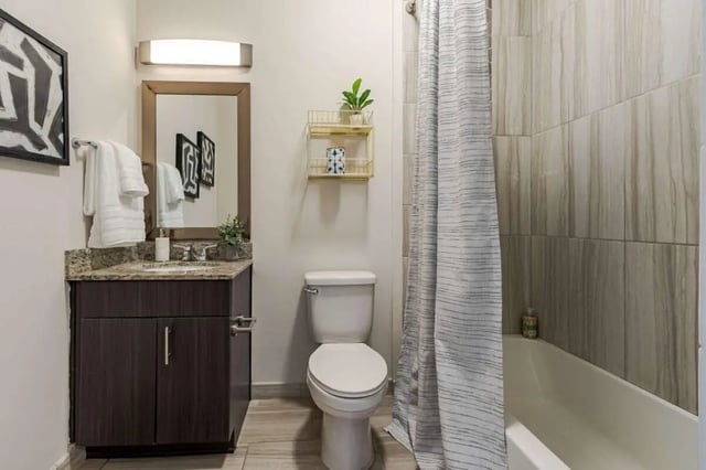 Vanity toilet tub and shower curtain bathroom at Hoffler Place in Charleston Student Accommodation