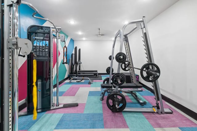 Weight machine treadmill barbell weights gym at Hoffler Place in Charleston Student Accommodation