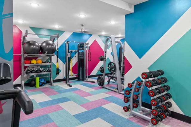 Dumbbells weight balls and machines gym at Hoffler Place in Charleston Student Accommodation