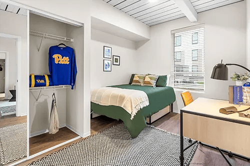 Closet bed desk lamp and artwork bedroom at HERE Pittsburgh in Pittsburgh Student Accommodation