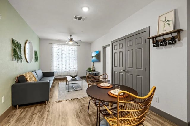 Sofa coffee table and dining set living room at Holleman Crossing in College Station Student Accommodation