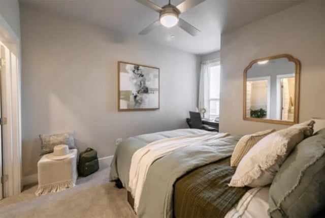 Bed with pillows desk and mirror bedroom at The Carlton House in Lubbock Student Accommodation