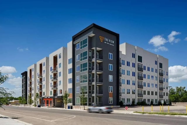 Modern apartment building with balconies exterior at The View on the Square in San Marcos Student Accommodation