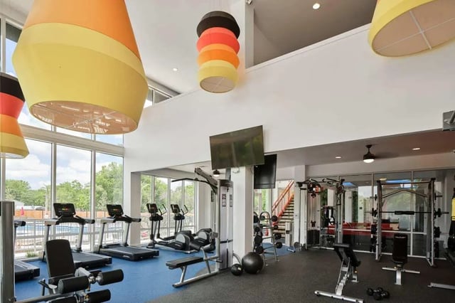 Treadmills ellipticals weight machines gym amenity area at The View on the Square in San Marcos Student Accommodation