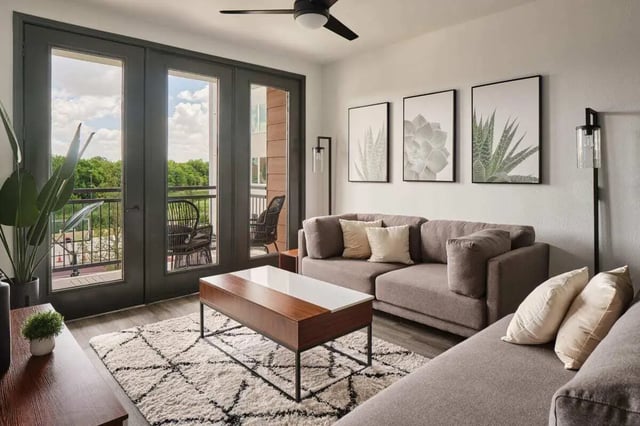 Sofa coffee table rug art living room at The View on the Square in San Marcos Student Accommodation